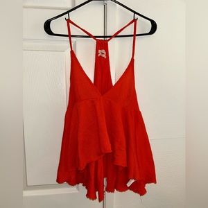 Cute babydoll cami tank with ruffles on bottom and soft feel fabric